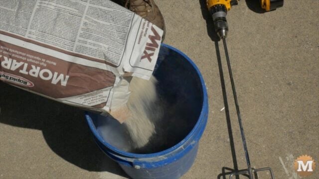 mixing concrete in a pail or bucket