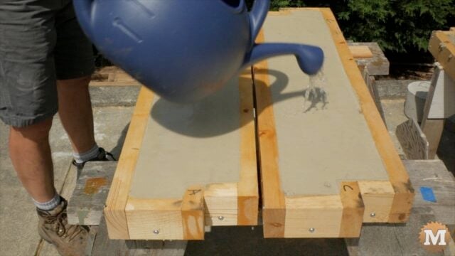 Water curing the CSA Concrete once solidified