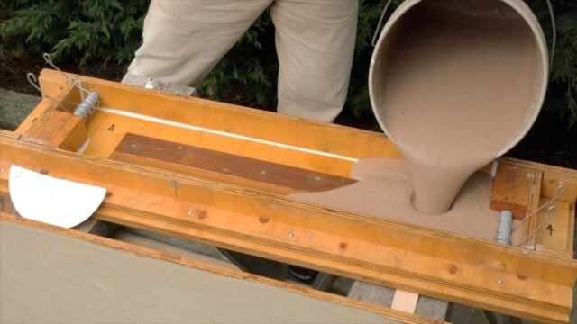 pouring CSA aircrete into a mold
